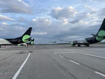 3 Flair Airlines planes on the runway at YKF